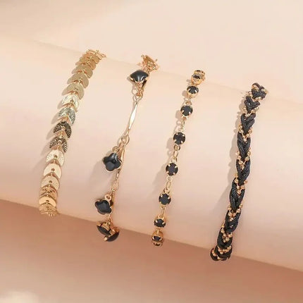Lucky Bloom – Ensemble Bohème 4 Bracelets Femme | Tressé, Trèfle Noir & Charms Élégants