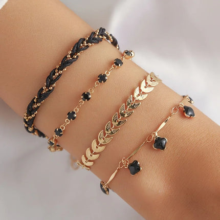 Lucky Bloom – Ensemble Bohème 4 Bracelets Femme | Tressé, Trèfle Noir & Charms Élégants