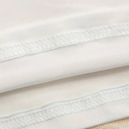 Top Blanc Douceur – Chic et Simplicité