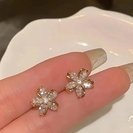 Boucles Fleur de Lumière – Élégance Dorée & Éclat Intemporel